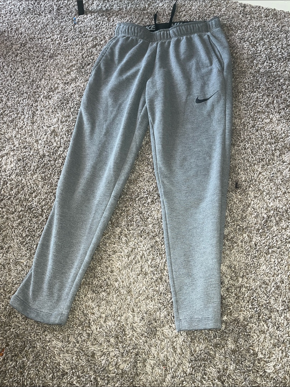 Nike Men’s Gray Heather Fleece Joggers with Black Swoosh